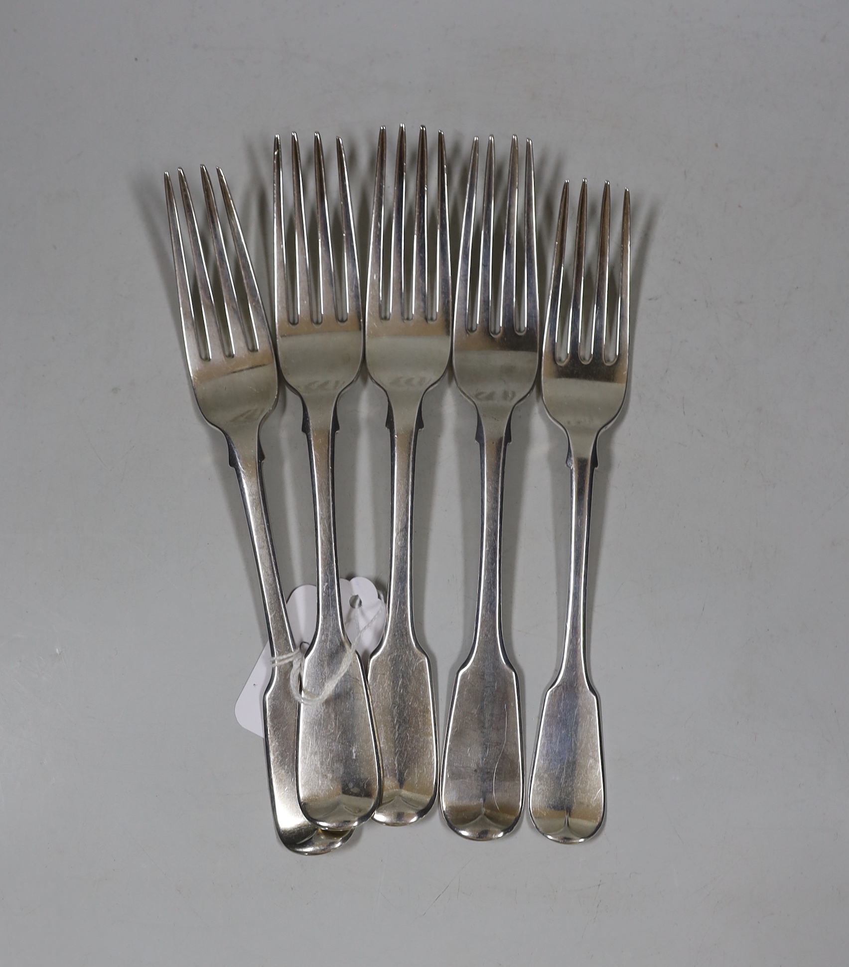 Five assorted George IV/William IV silver fiddle pattern table forks, including four London, 1827, 11.7oz